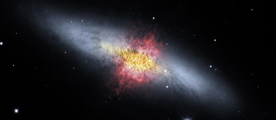 Magnetfeltlinier transporterer enorme mængder støv og gas ud fra M82 galaksen