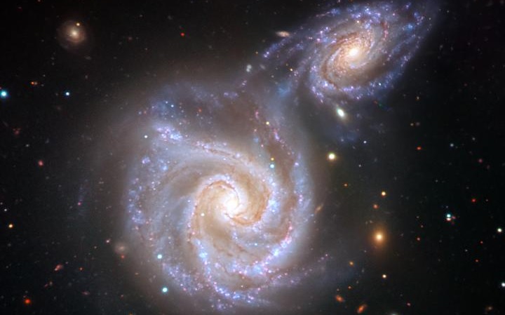 Illustration af Mælkevejen og den kolliderende galakse, baseret på fotosaf andre kollisioner fra ESO