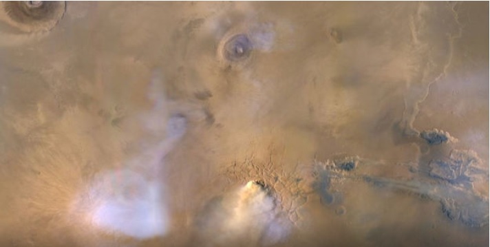 Støvtårne på Mars som sender støv og vanddampe op af Mars tynde atmosfære