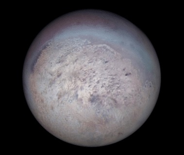 Neptun-månen Triton, fortograferet af Voyager2 Neptun-månen Triton, fortograferet af Voyager2